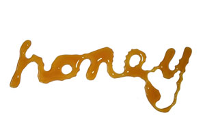 honey - Schriftzug aus zerlaufenem Zucker